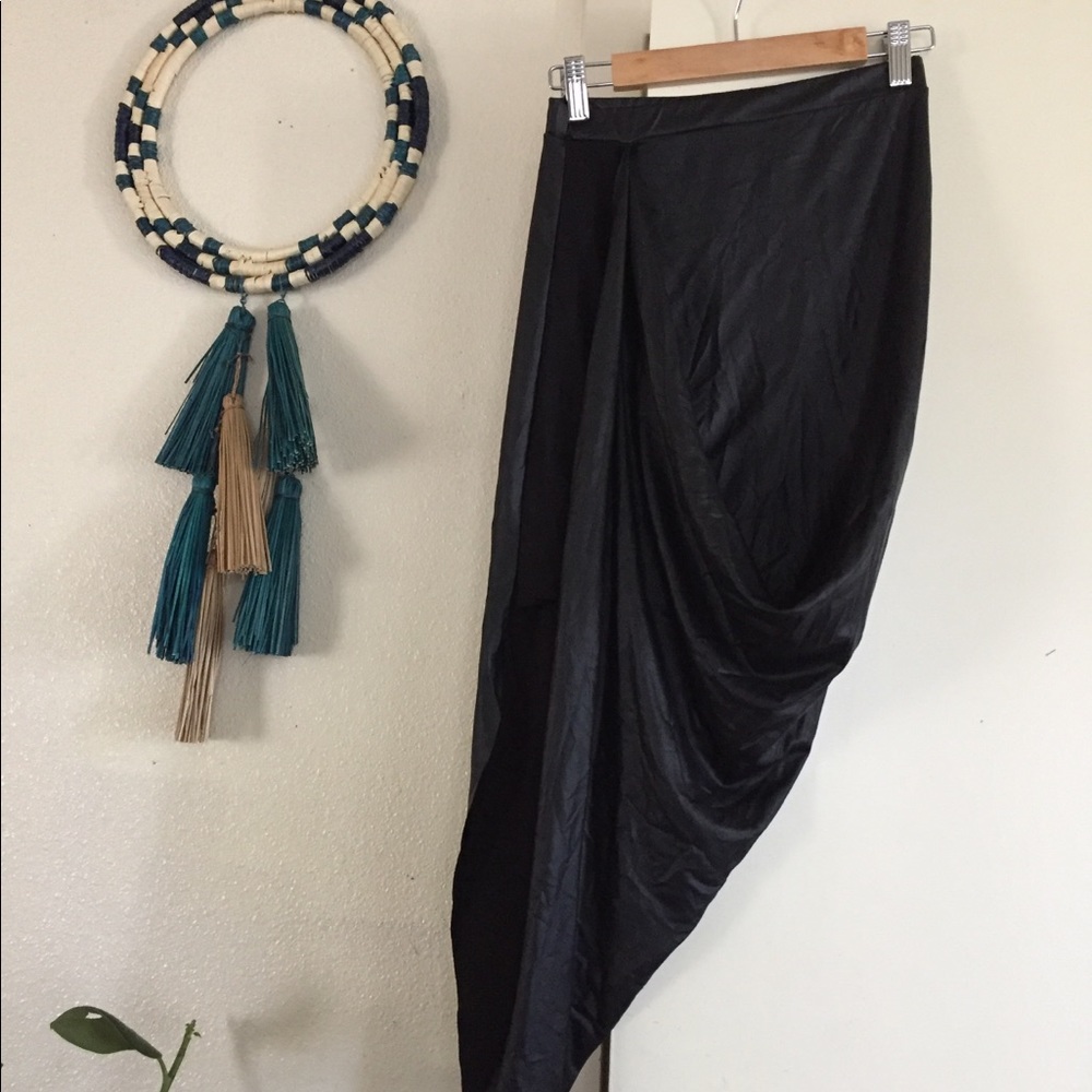 Faux leather wrapped skirt w/ mini side-slit.